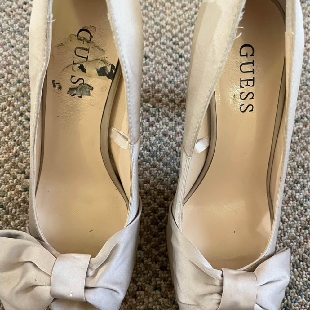Guess nude colored high heels.